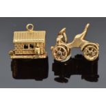 Two 9ct gold charms, one in the form of a garage opening to reveal a car,the other a car, 6.6g