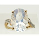 A 9ct gold ring set with an oval cut ice opal and diamonds, 3.6g, size N