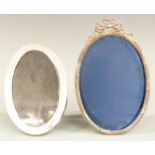 Two Oval photograph frames, one hallmarked silver Birmingham 1945, height 11.5cm the other marked