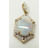 A 9ct gold pendant set with an oval black opal cabochon and diamonds, 2.4g