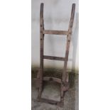 Early 20thC large mahogany and cast iron railway porter's heavy duty sack truck, the cast iron