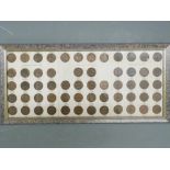 Framed display of half pennies 1915-1967