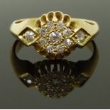 An early 20thC 18ct gold ring set with old cut diamonds, 3.6g, size J/K