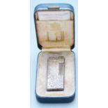 Dunhill Rollagas silver plated retro bark effect lighter, in original box with instructions