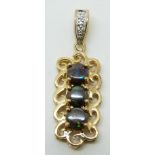 A 9ct gold pendant set with three round cut boulder opals and diamonds, 2.9g