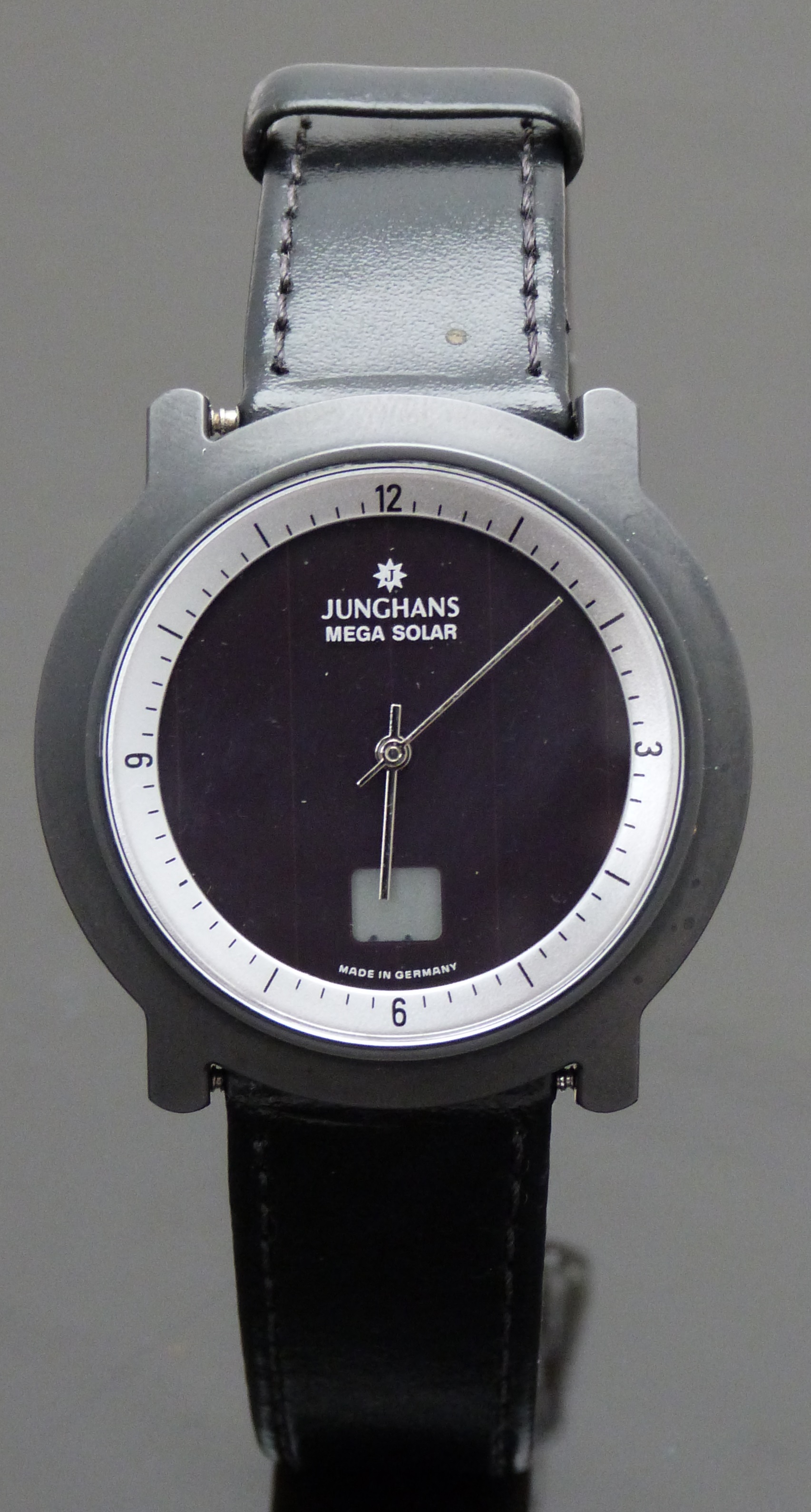 Junghans Mega Solar gentleman's wristwatch with stainless steel hands, silver inner bezel, digital