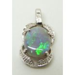 A 9ct white gold pendant set with a black opal and diamonds, 1.7g