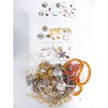 A collection of jewellery including silver rings, pearl necklace, brooches including cameo and