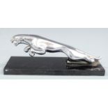 Chrome Jaguar car mascot on black display base, length of mascot 19.5cm