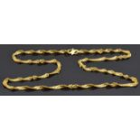 A yellow metal necklace made up of a twisted links, marked 916 for 22ct gold, 7.1g