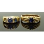 Two yellow metal rings set with synthetic sapphires, sizes F & N, 6.52g