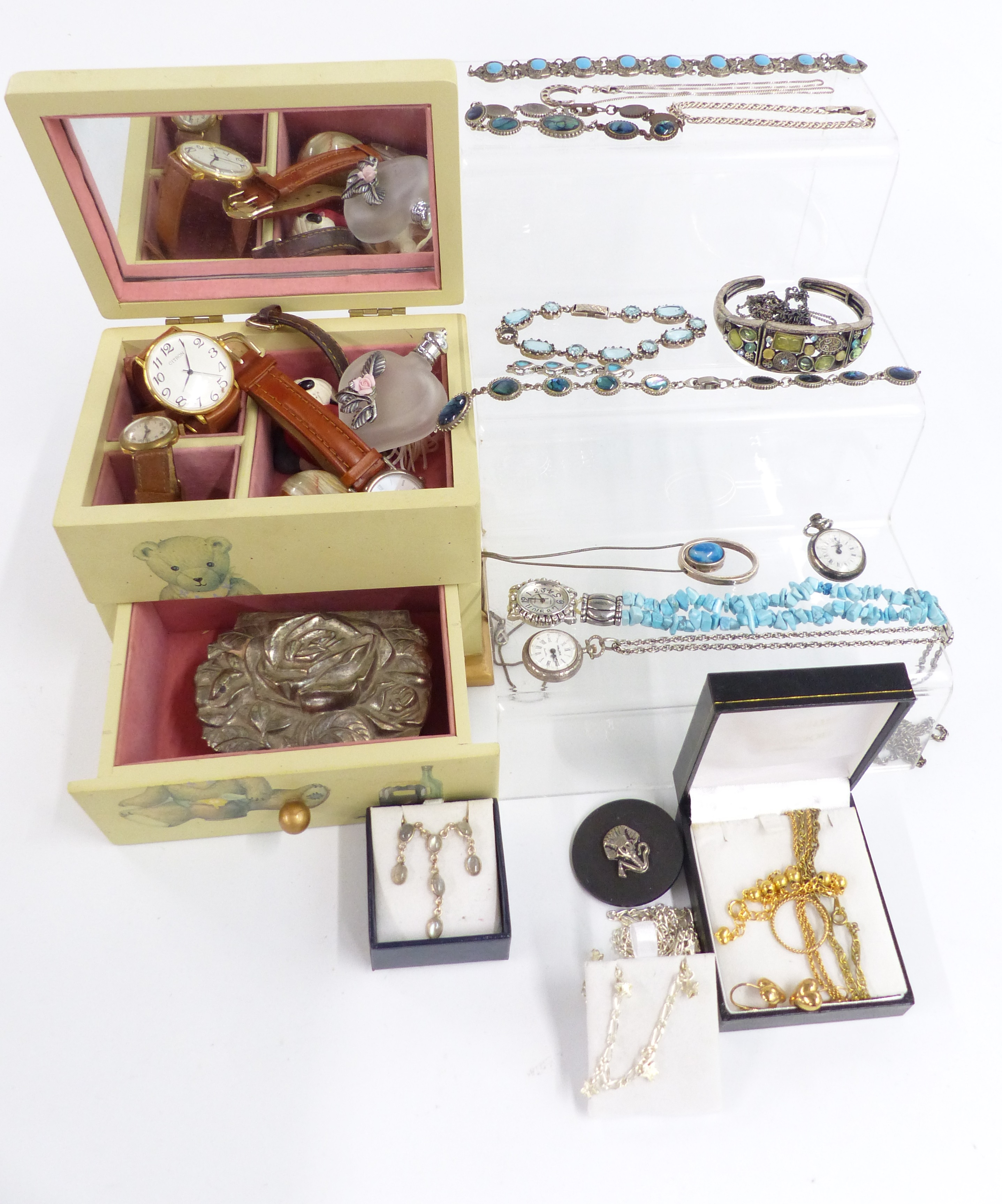 A collection of costume jewellery including watches, yellow metal watch back, silver bracelet set