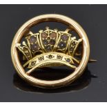 A 15ct gold brooch in the form of a crown, 1.9cm diameter, 2.8g