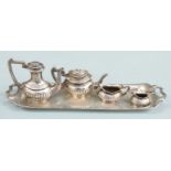 Novelty hallmarked silver tea set on tray comprising tray, teapot, sugar bowl and milk jug, London