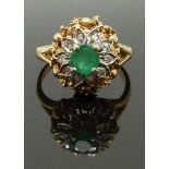 A 9ct gold ring set with a round cut emerald surrounded by diamonds, size L, 4.00g