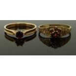 Two 9ct gold rings set with garnets to each, size N & P/Q, 3.41g