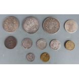 A collection of silver coins comprising Victorian 1845 wreath crown, 1898 veiled head example,