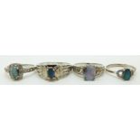 Four silver rings set with boulder opal, size L, M, N, T