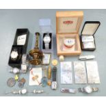 A collection of items including white metal Chinese plaques or ingots, weight 406g, watches, 1851