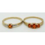 Two 9ct gold rings, one set with a Mexican fire opal and diamonds and the other three fire opals,