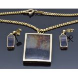 A 9ct gold pendant set with a rectangular section of blue john on 9ct gold chain with similar