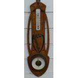 Art Nouveau aneroid barometer with inlaid marquetry decoration with floral brass overlay, 49cm tall