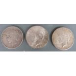 Three USA Liberty/peace silver dollars, 1922, 1923 and 1926