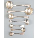 Mainly Georgian hallmarked silver ladles and salt/mustard spoons including a Peter & William Bateman