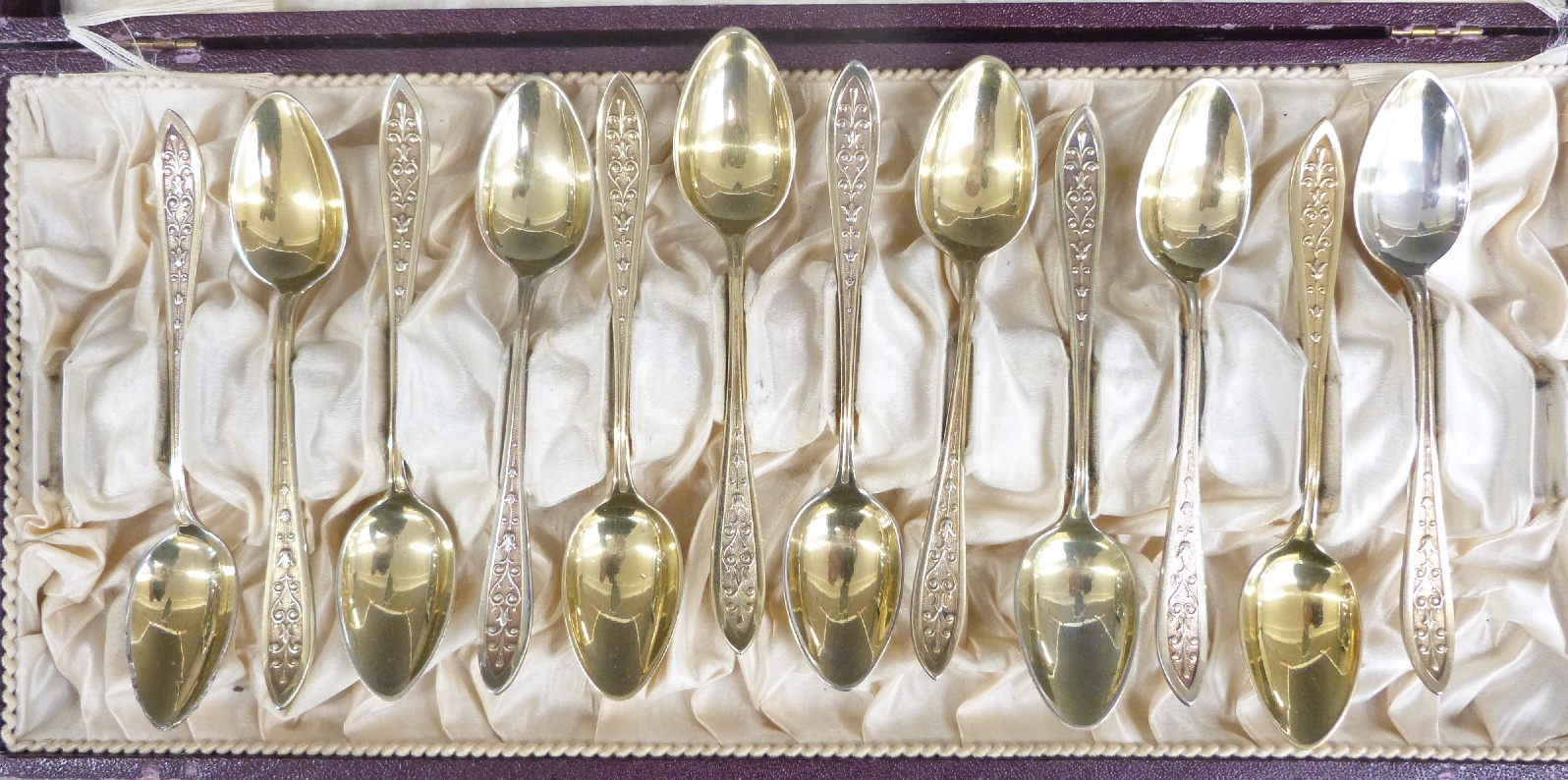 Cased set of 12 gilt metal spoons and two Swedish silver spoons, weight 43g - Image 2 of 7