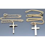 Two 9ct gold crosses and chains, 5.7g