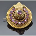 Victorian Etruscan Revival brooch with engraved and sphere decoration set with foiled garnets, verso