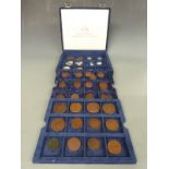 A cased collection of Russian coins to include 1763 Kopek, 1764 five Kopek and later examples