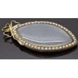 A large Victorian marquise shaped locket with a faux pearl border and bow decoration, maker A.W, 7.5