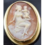 An 18ct gold brooch/pendant set with a cameo depicting a woman and child, 3.8 x 3cm