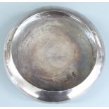 Japanese white metal bowl raised on three ball feet, marked to underside Suzuyo 950, diameter