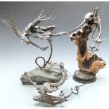 Three modern dragon sculptures in the manner of Walenty Pytel, height of tallest 50cm