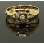 An 18ct gold ring set with diamonds, Birmingham 1913, size M, 1.89g