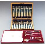 Cased twelve place setting dessert knife and fork set with ivory handles together with a retro