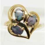 A 9ct gold ring set with three Australian boulder opals, 3.4g, size N