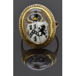 Victorian 9ct gold ring set with Essex crystal cabochon depicting a crest in Victorian ring box,