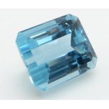 A loose emerald cut aquamarine measuring approximately 6.4cts
