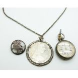 Maria Theresa silver coin in pendant mount, a white metal chain,a silver fob watch and silver