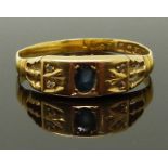 Edwardian 18ct gold ring set with a sapphire and diamonds, Birmingham 1909, size P, 2.05g