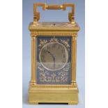 A c1900 brass cased carriage clock with half hourly repeater mechanism no 6828, the dial with