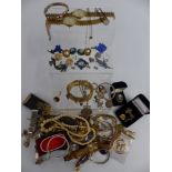 A collection of costume jewellery including watches, silver bracelets, agate pendant, cameo