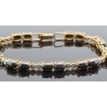 A 9ct gold bracelet set with Australian boulder opal cabochons and diamonds, 11.2g
