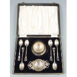 Art Deco style hallmarked silver tea set comprising six teaspoons, tea strainer and stand,