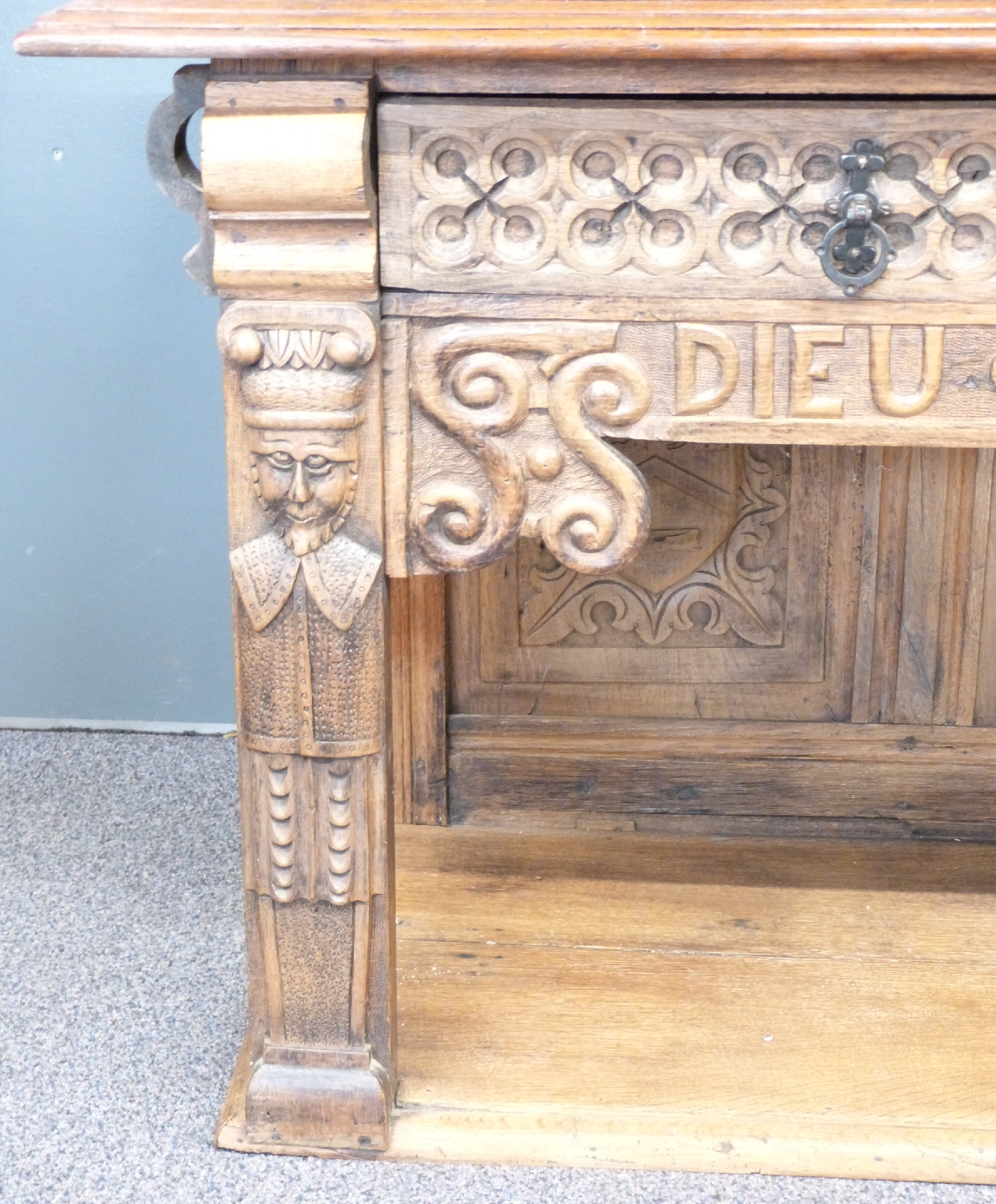 French 19th/20thC oak low table with two drawers, undershelf and carved figural decoration either - Image 2 of 3