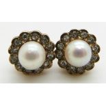 A pair of 9ct gold earrings set with a pearl surrounded by diamonds, 2.2g