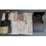 A collection of Edwardian and later gloves including kid leather, suede evening gloves, white